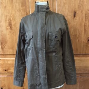 Olive green jacket with queen bee design on the back. Size M